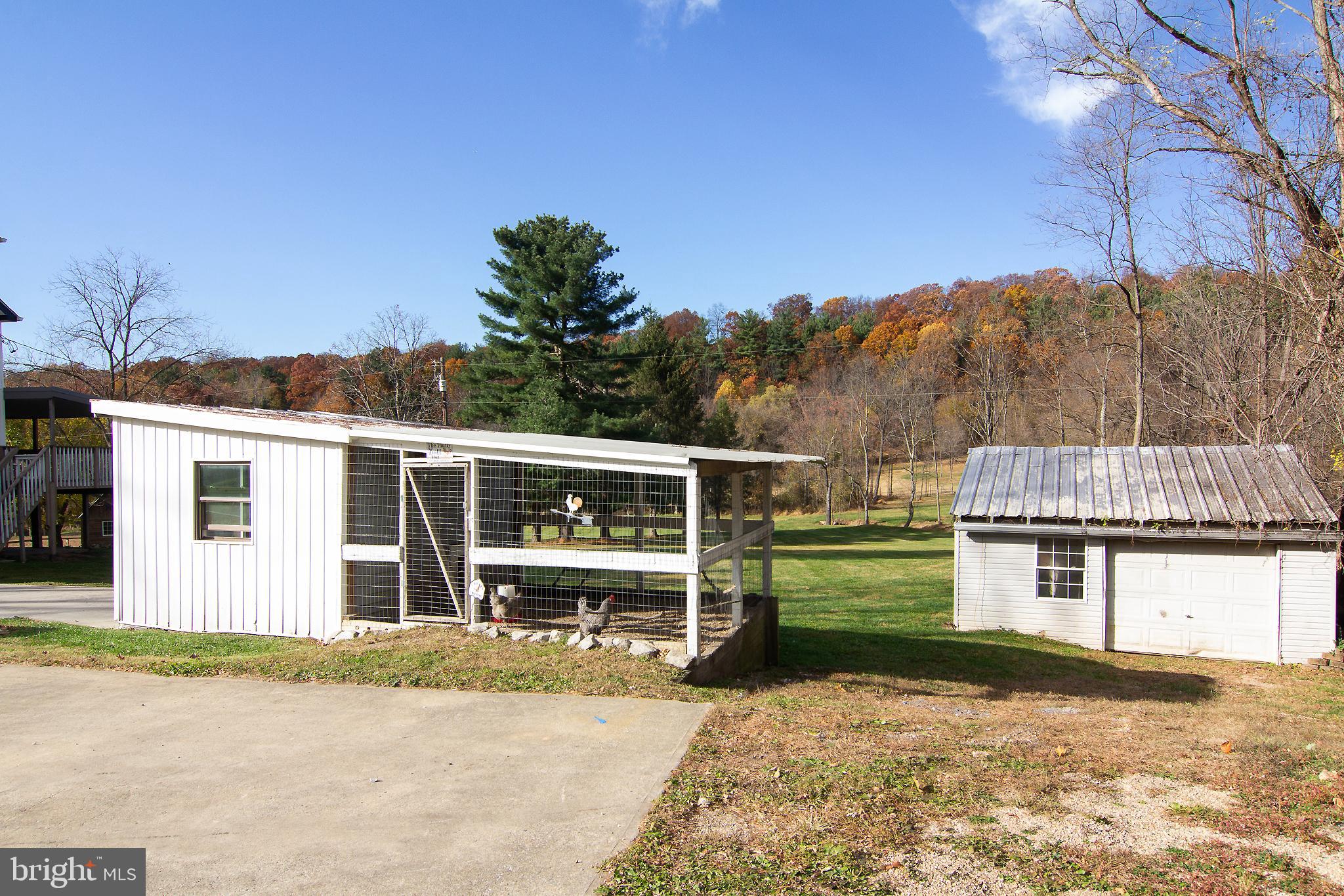400 Leppo Road Westminster, MD 21158 - Photo 40 of 59 a front view of a house with a yard