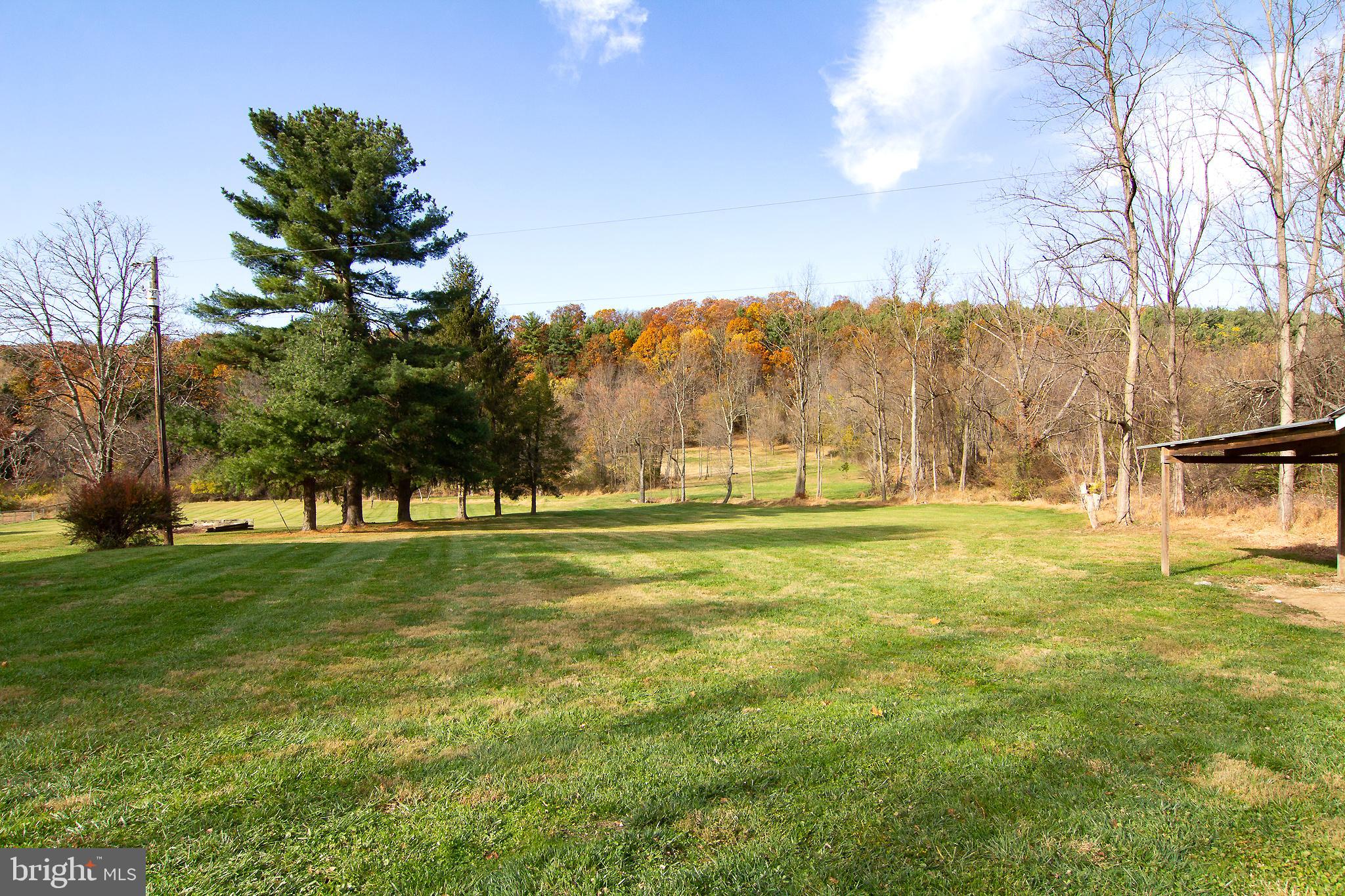 400 Leppo Road Westminster, MD 21158 - Photo 41 of 59 a view of grassy field with trees