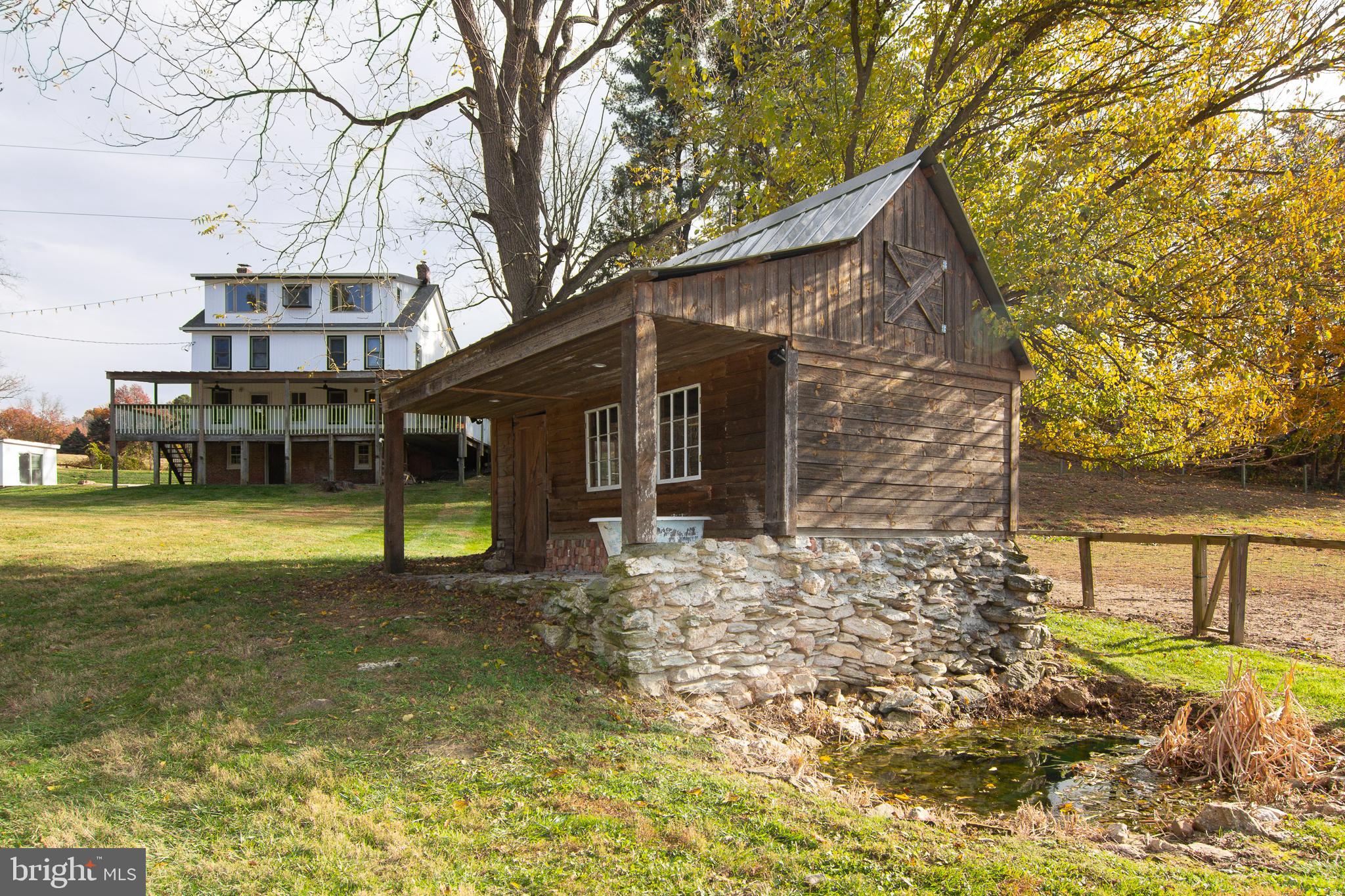 400 Leppo Road Westminster, MD 21158 - Photo 48 of 59 a view of a house with a yard