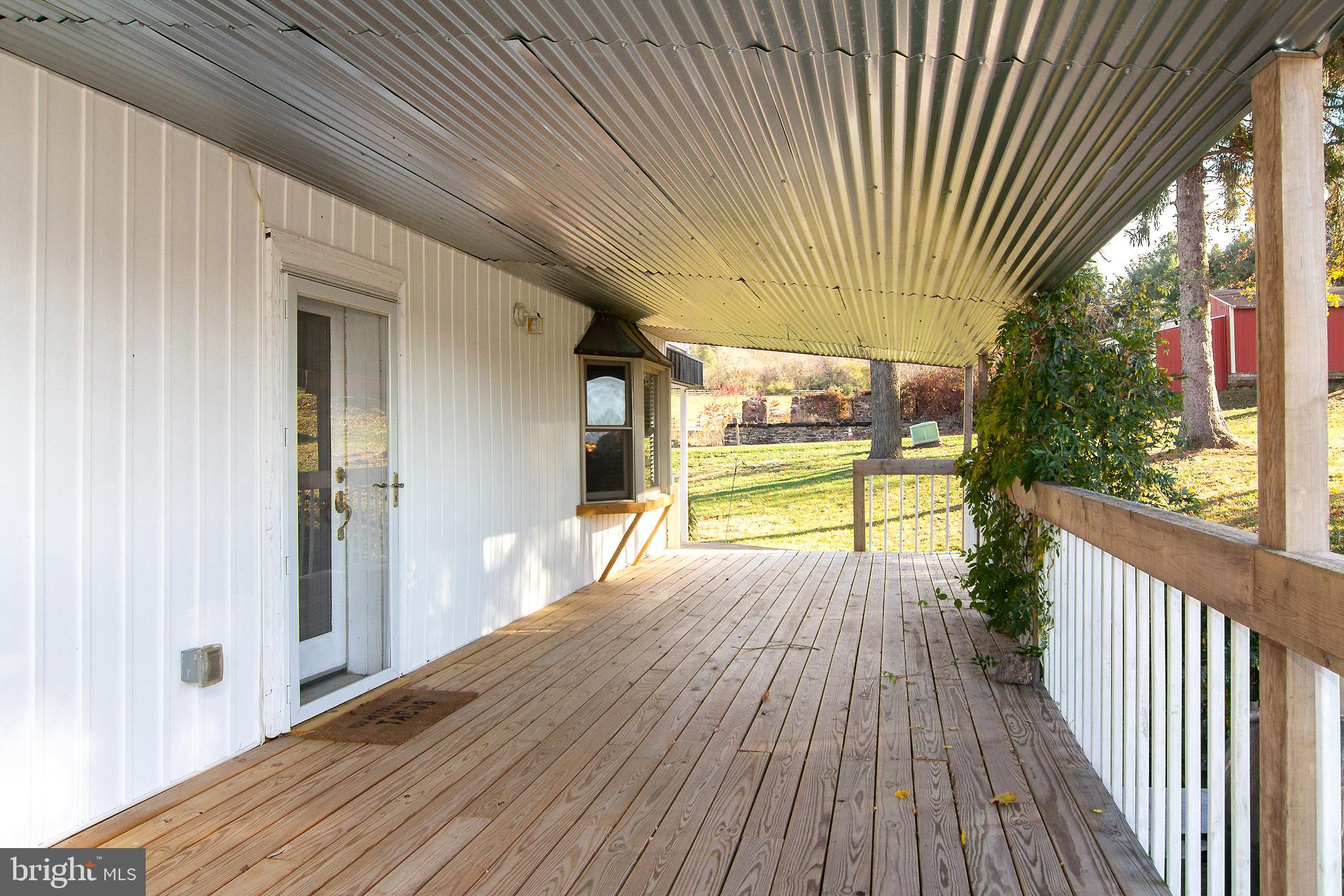 400 Leppo Road Westminster, MD 21158 - Photo 53 of 59 a view of a house with a porch