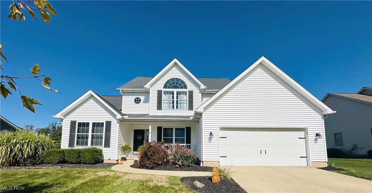2435 Queensbury Road Alliance, OH 44601 - Photo 1 of 36 Traditional home with a porch, driveway, and a front yard