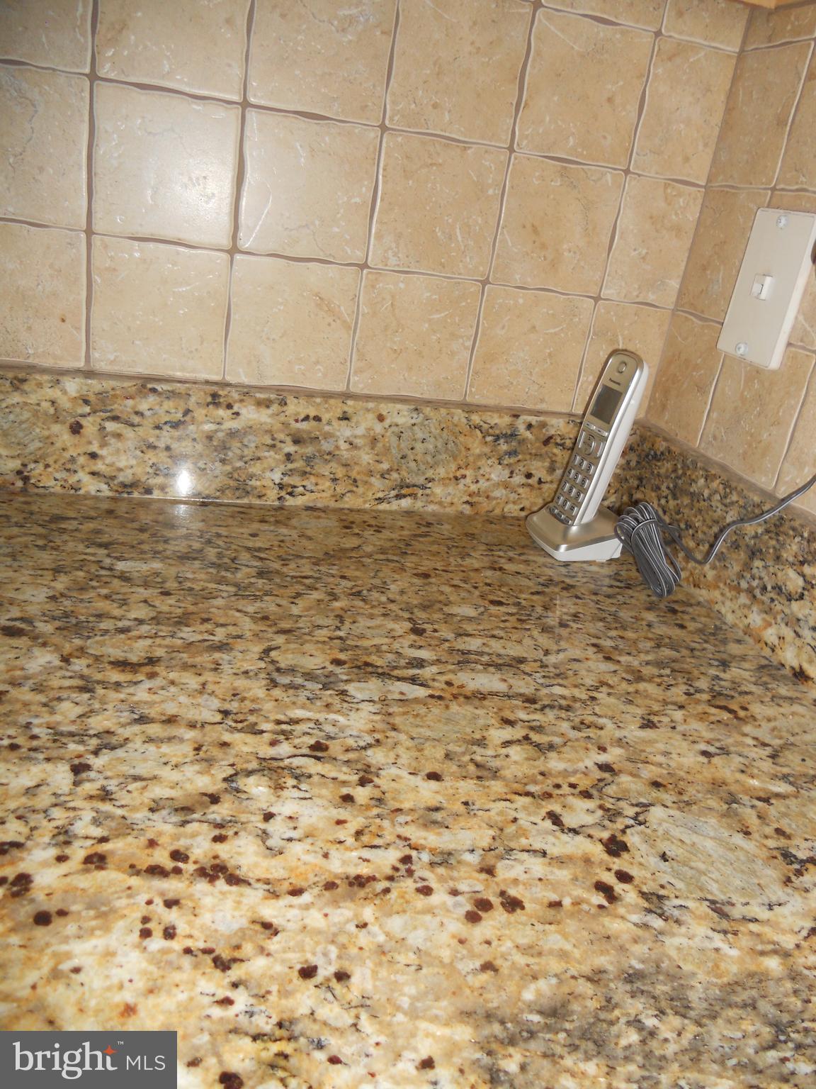 9700 Decatur Road Middle River, MD 21220 - Photo 7 of 23 Kitchen granite and backsplash