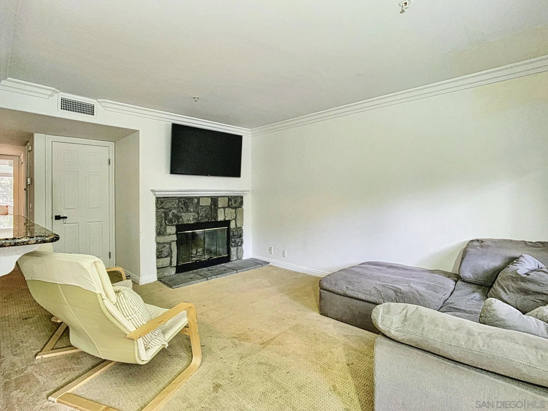 1434 Marshall Road, Unit 36 Alpine, CA 91901 - Photo 13 of 28 a living room with furniture and a fireplace
