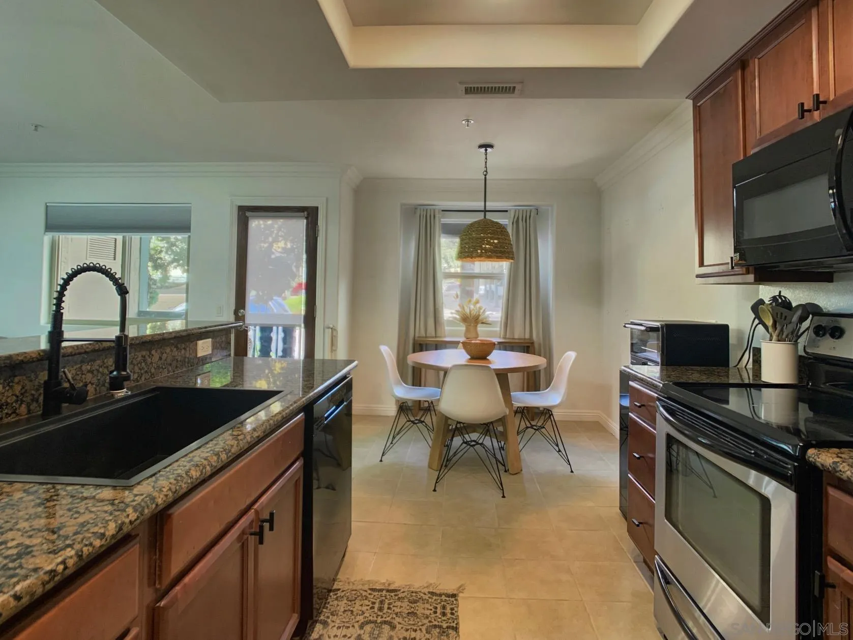 1434 Marshall Road, Unit 36 Alpine, CA 91901 - Photo 8 of 28 a kitchen with a sink stove and microwave
