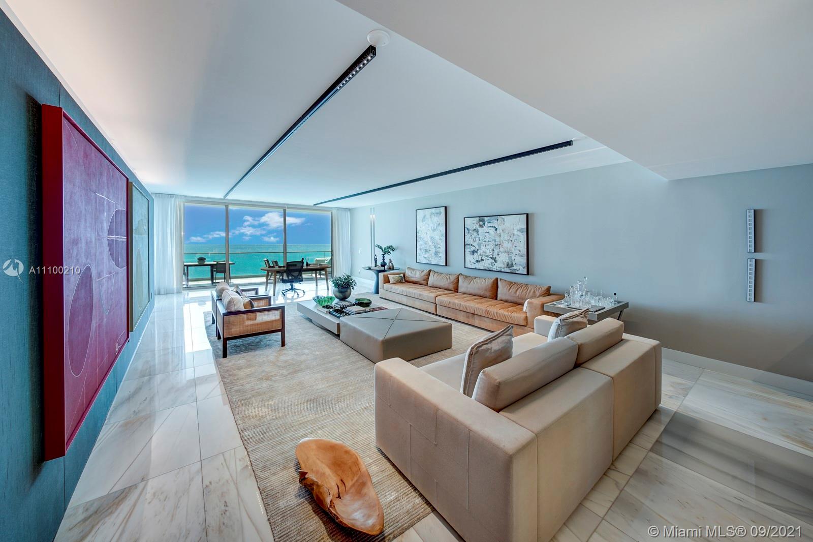10203 Collins Avenue, Unit 1802 Bal Harbour, FL 33154 - Photo 11 of 43 a living room with furniture and a large window