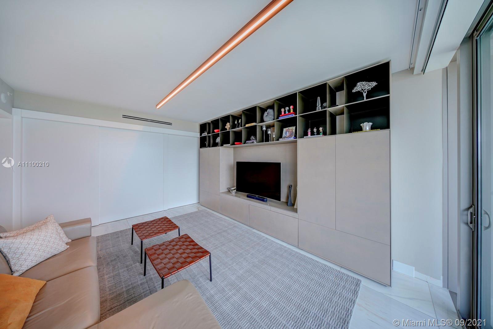10203 Collins Avenue, Unit 1802 Bal Harbour, FL 33154 - Photo 15 of 43 a living room with furniture