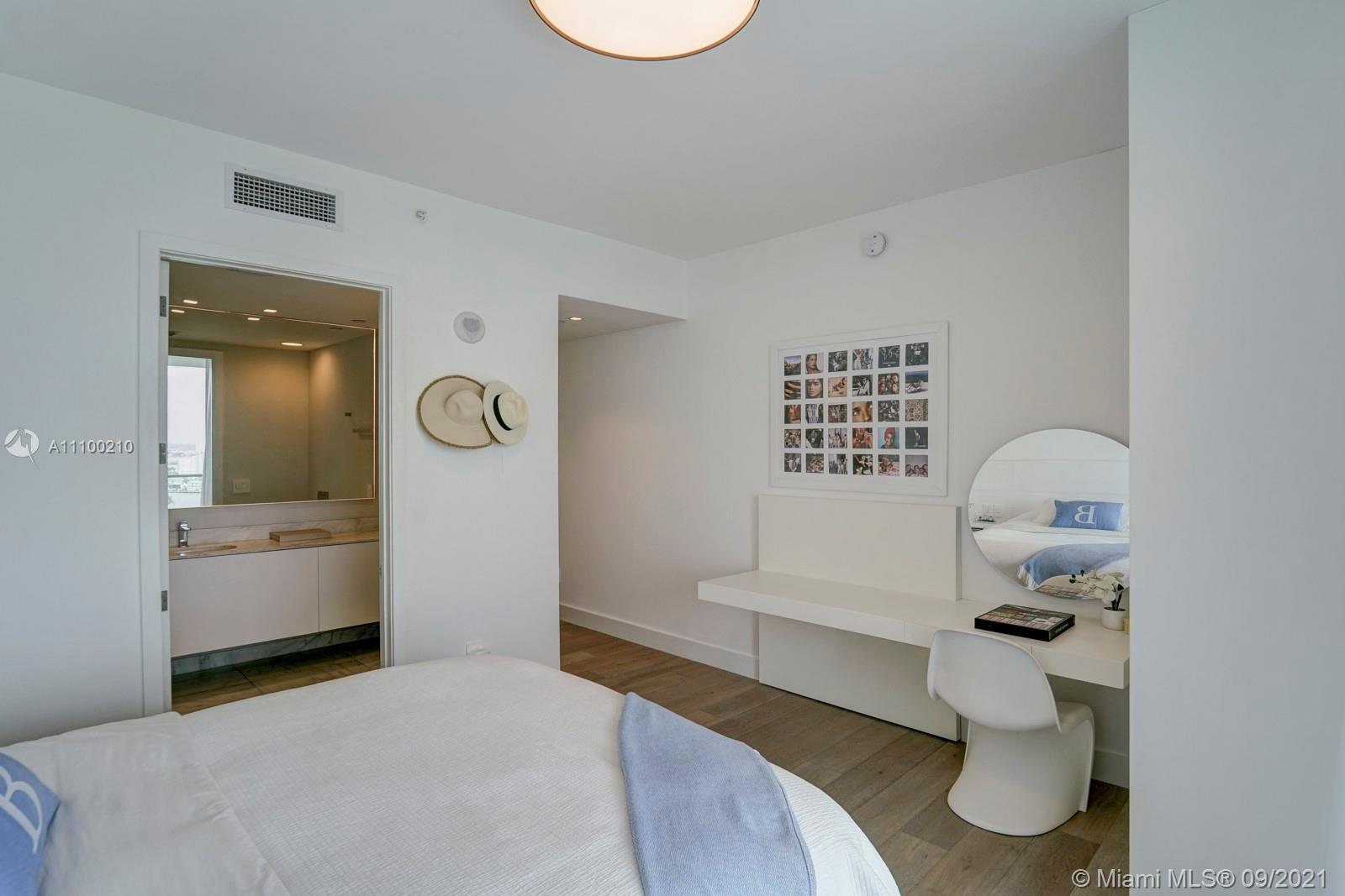 10203 Collins Avenue, Unit 1802 Bal Harbour, FL 33154 - Photo 37 of 43 a bathroom with a sink toilet and shower