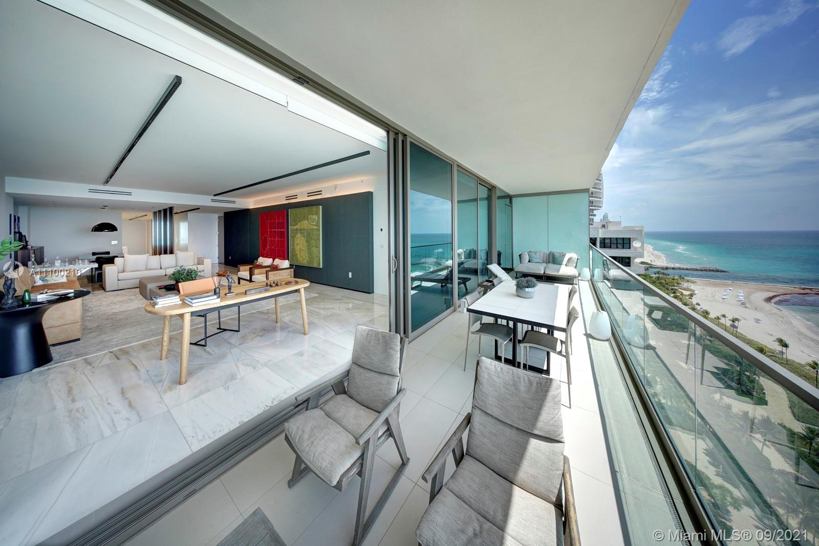 10203 Collins Avenue, Unit 1802 Bal Harbour, FL 33154 - Photo 6 of 43 a living room with lots of furniture and kitchen view
