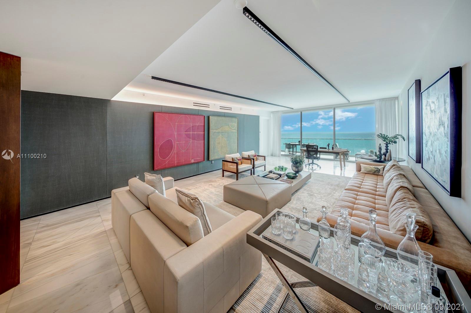 10203 Collins Avenue, Unit 1802 Bal Harbour, FL 33154 - Photo 8 of 43 a living room with furniture and a large window