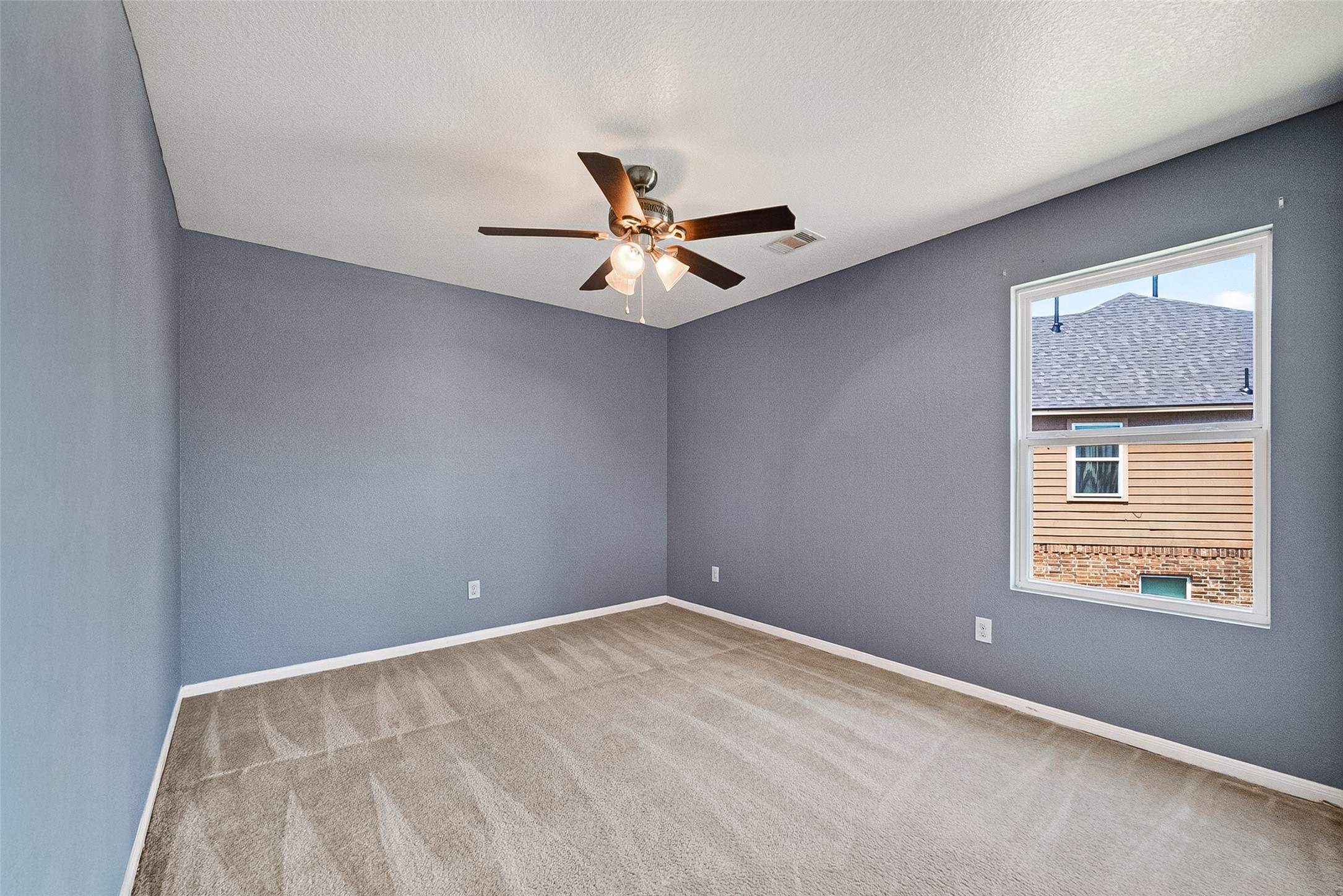 2702 Modano Court Fresno, TX 77545 - Photo 28 of 46 a view of an empty room with a window