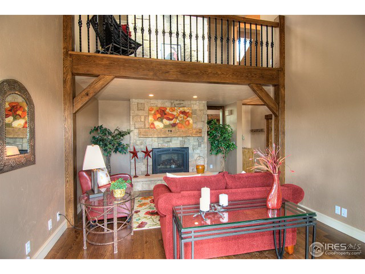 3850 Spring Valley Road Boulder, CO 80304 - Photo 12 of 25 a view of a dining room with furniture a fireplace and large window