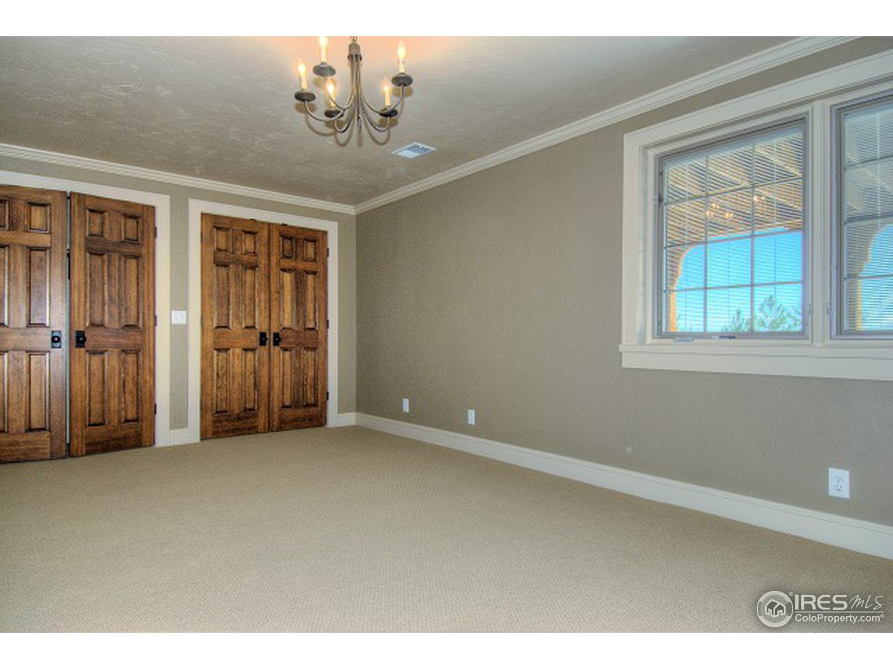 3850 Spring Valley Road Boulder, CO 80304 - Photo 23 of 25 an empty room with windows