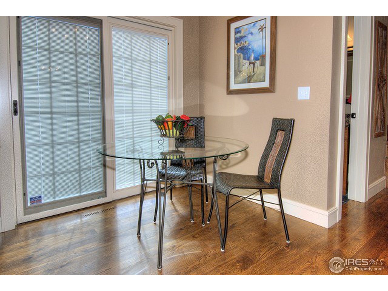 3850 Spring Valley Road Boulder, CO 80304 - Photo 6 of 25 a dining room with furniture and wooden floor
