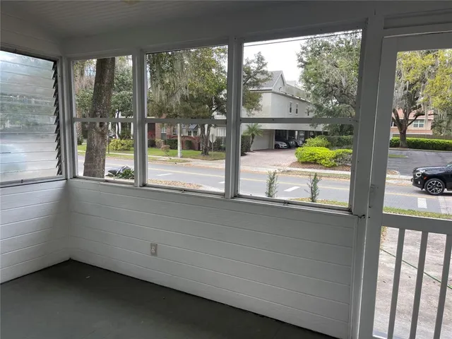 a view of a large window with a swimming pool