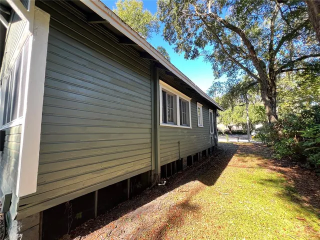 a view of a house with a large window