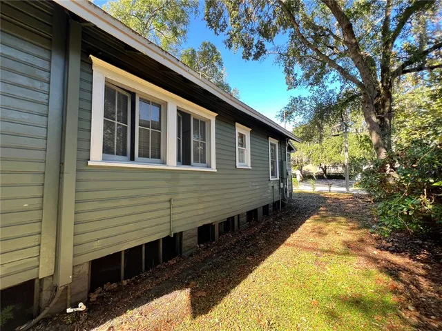 a view of a bench in a backyard