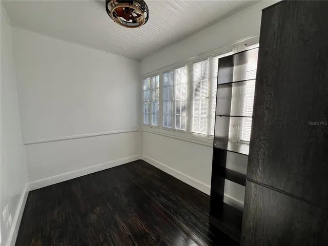 a view of small space with wooden floor