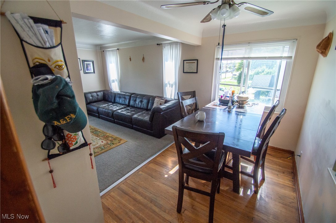 6474 Ridge Road Parma, OH 44129 - Photo 20 of 41 Dining area featuring wood-type flooring and ceiling fan