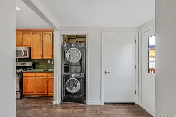 a utility room with dryer and washer