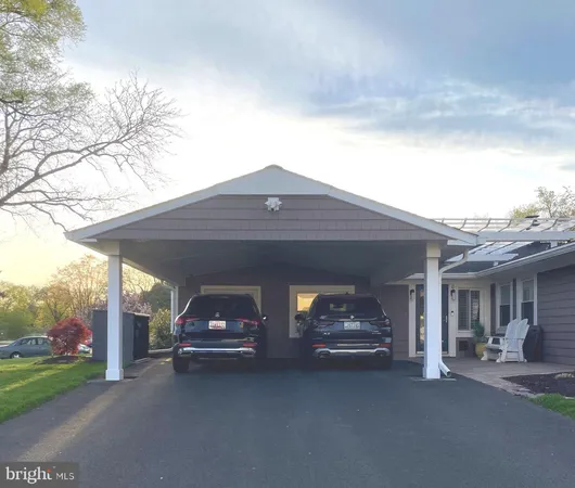 a living room with a large window and a couch