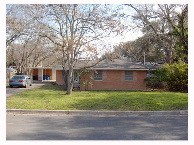 707 Josephine Street Austin, TX 78704 - Photo 1 of 1 a view of a yard in front of a house with large trees