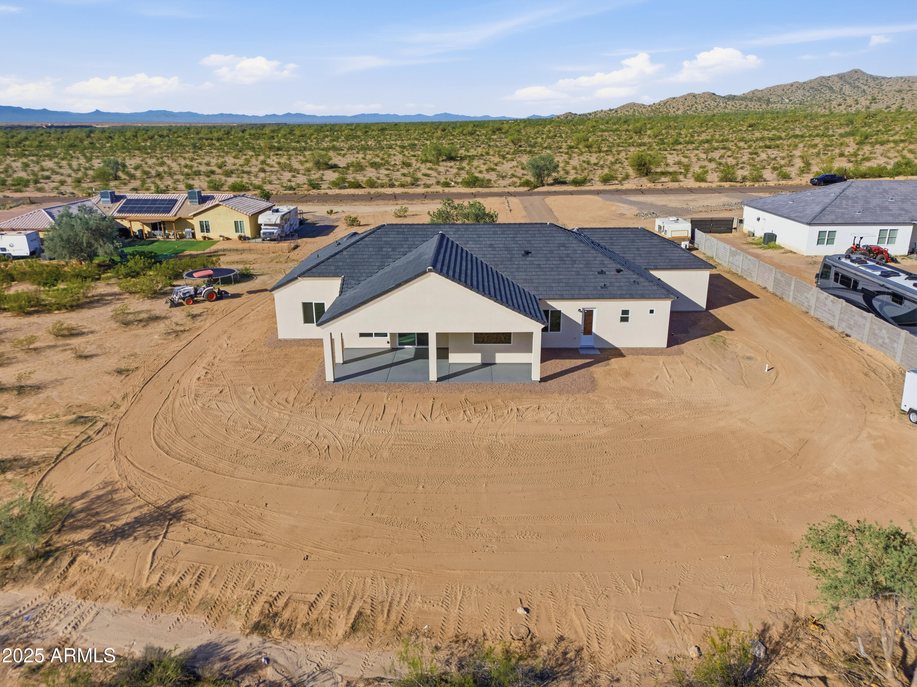 10039 North Burris Road Casa Grande, AZ 85122 - Photo 14 of 61 a view of a city with an ocean beach