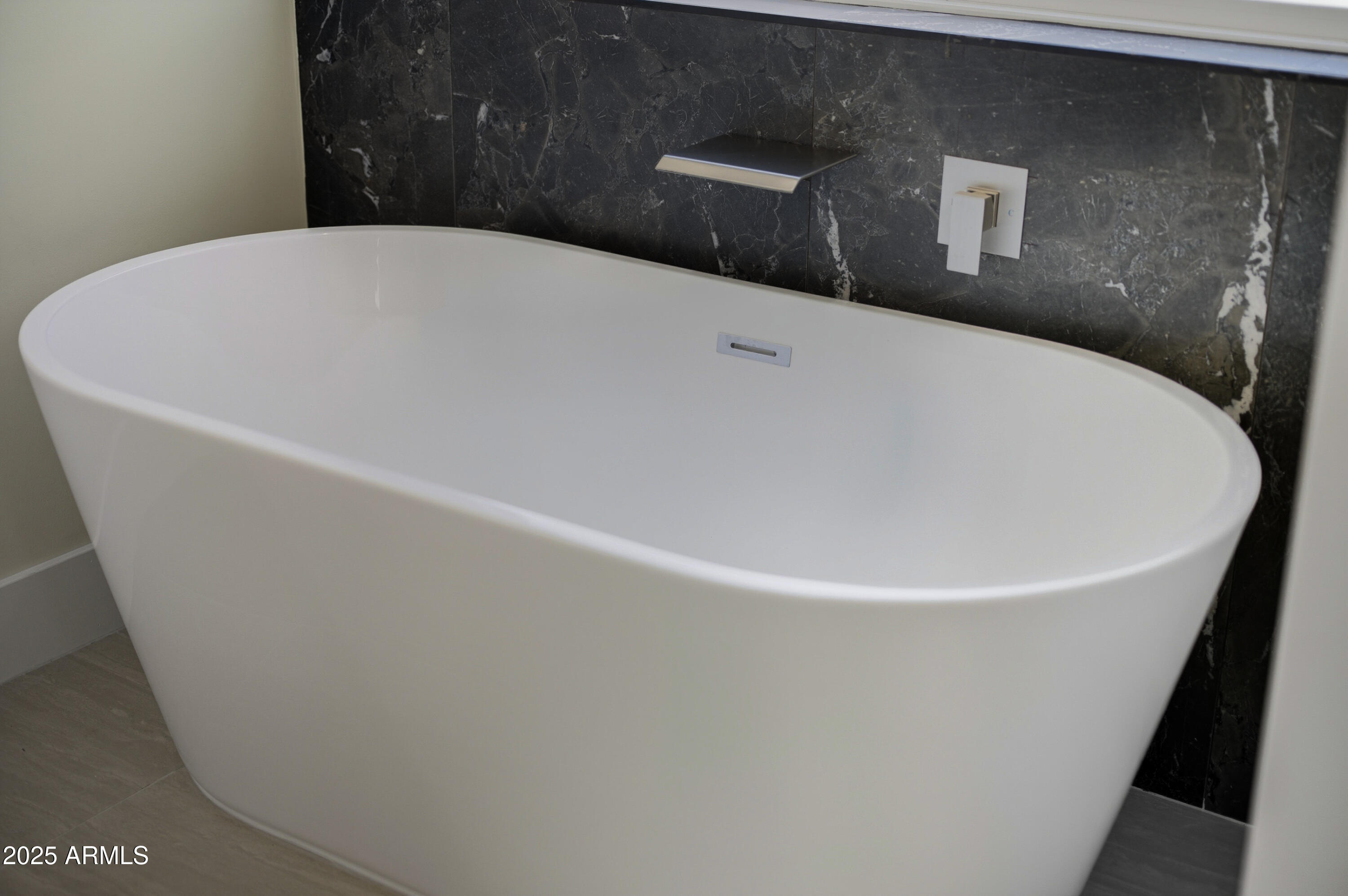 10039 North Burris Road Casa Grande, AZ 85122 - Photo 34 of 61 a white bath tub sitting in a bathroom