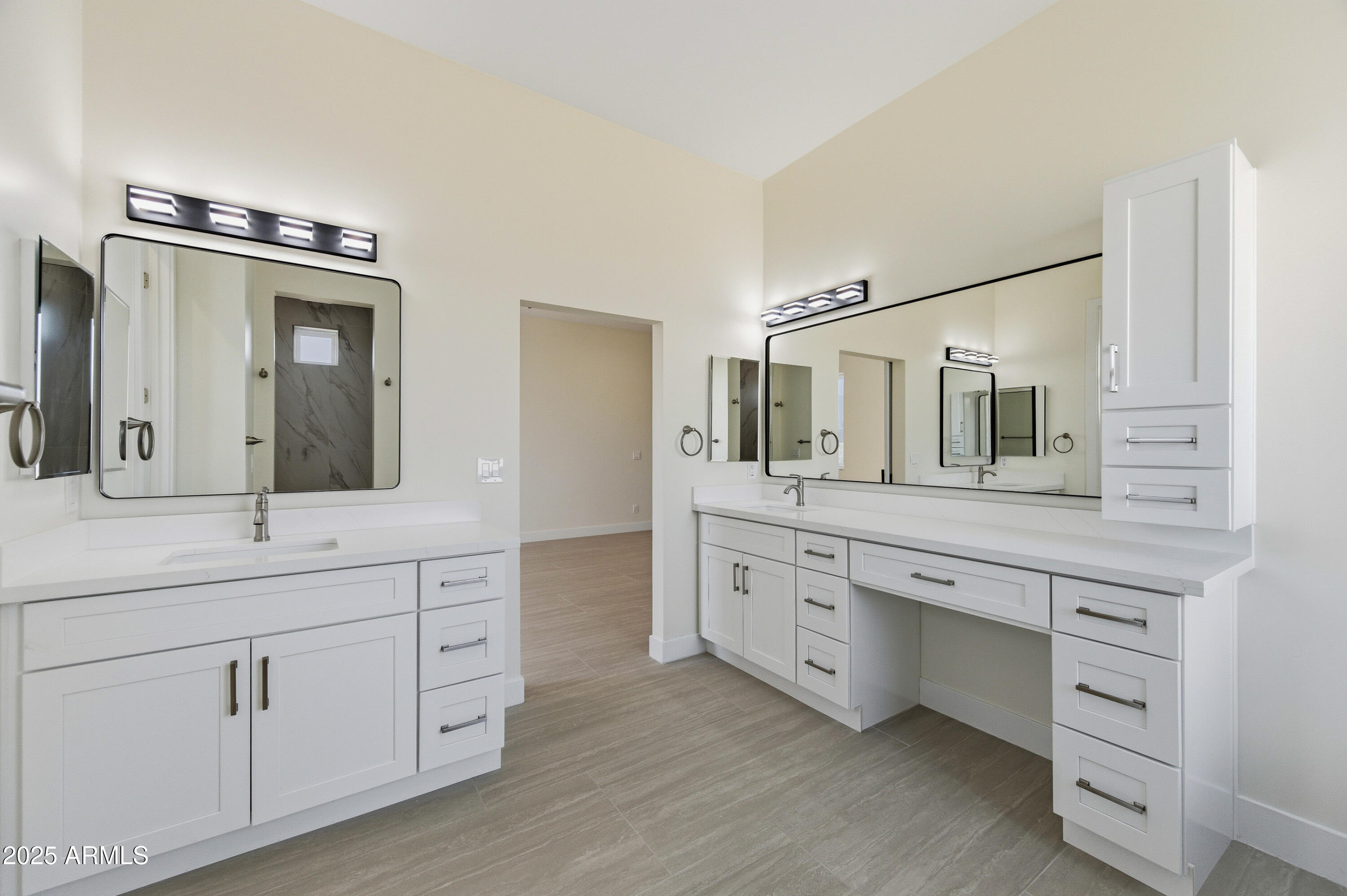 10039 North Burris Road Casa Grande, AZ 85122 - Photo 37 of 61 a spacious bathroom with a granite countertop sink and a mirror