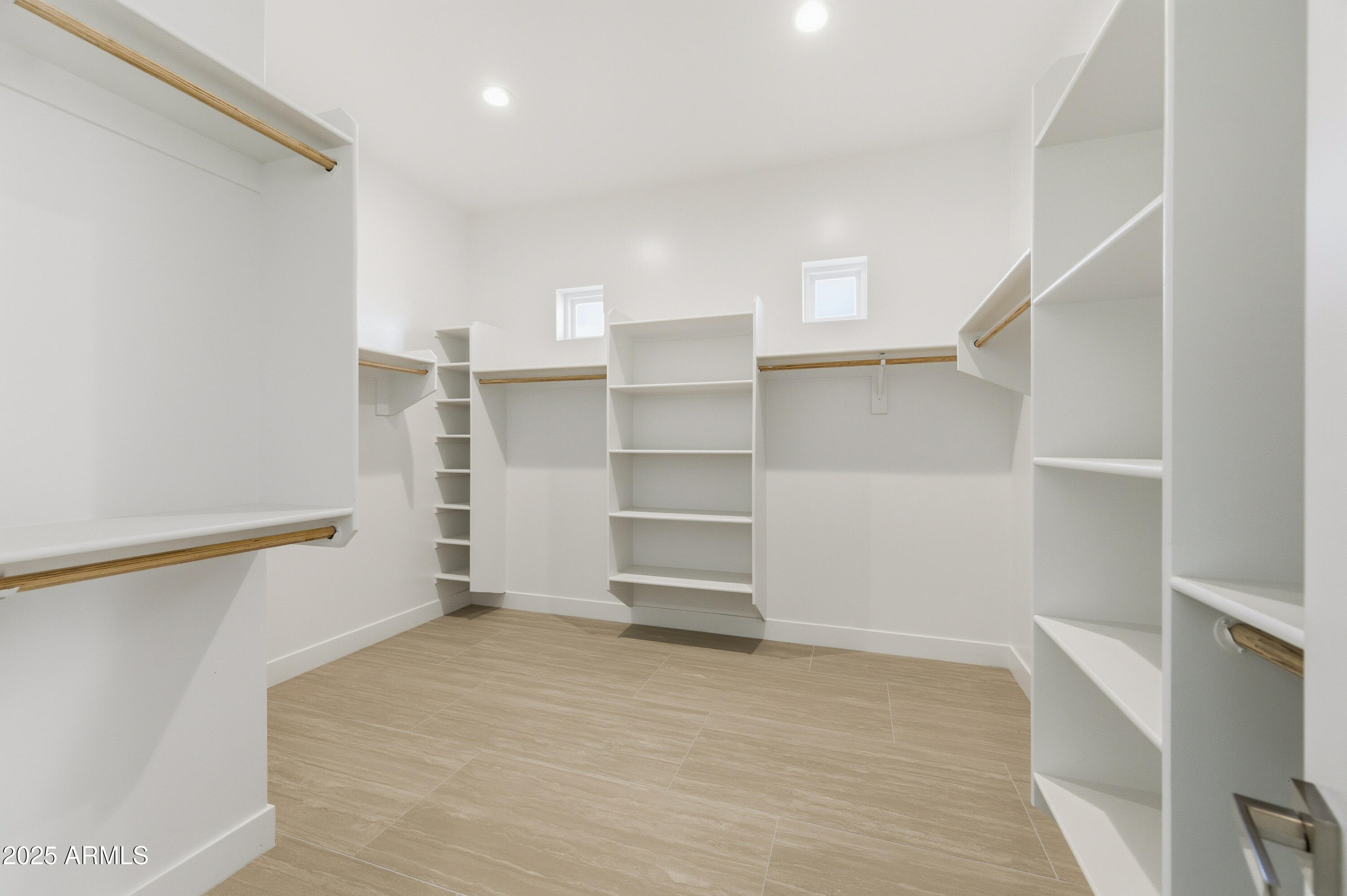 10039 North Burris Road Casa Grande, AZ 85122 - Photo 38 of 61 a view of walk in closet with empty racks