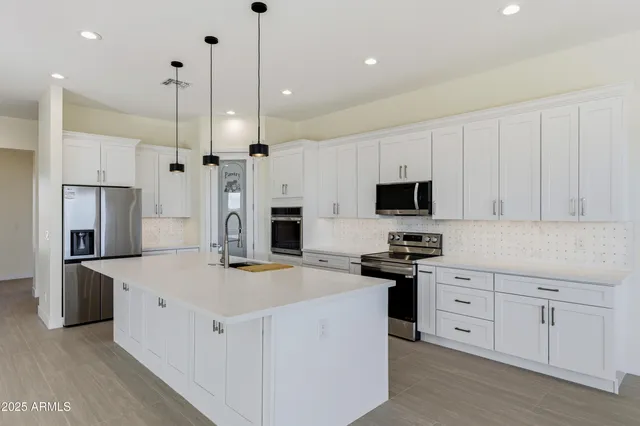 an empty room with a workbench