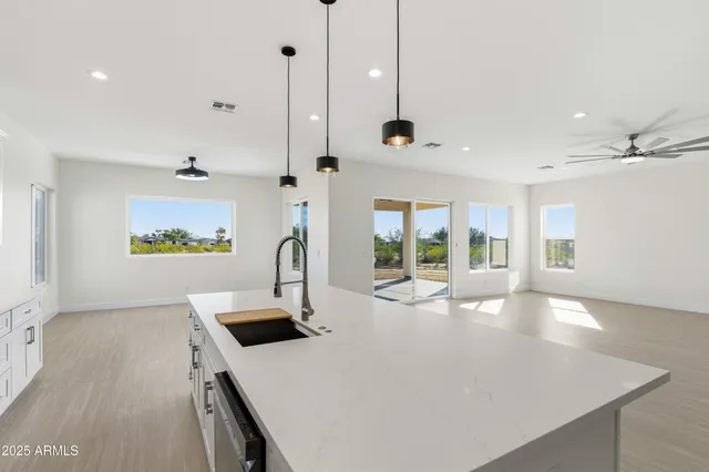 a bathroom with a toilet sink and shower