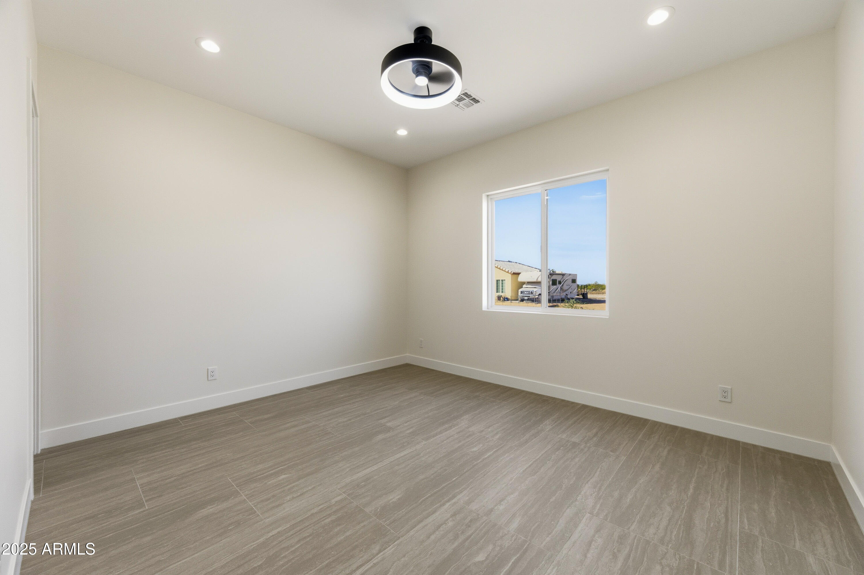 10039 North Burris Road Casa Grande, AZ 85122 - Photo 54 of 61 an empty room with a window