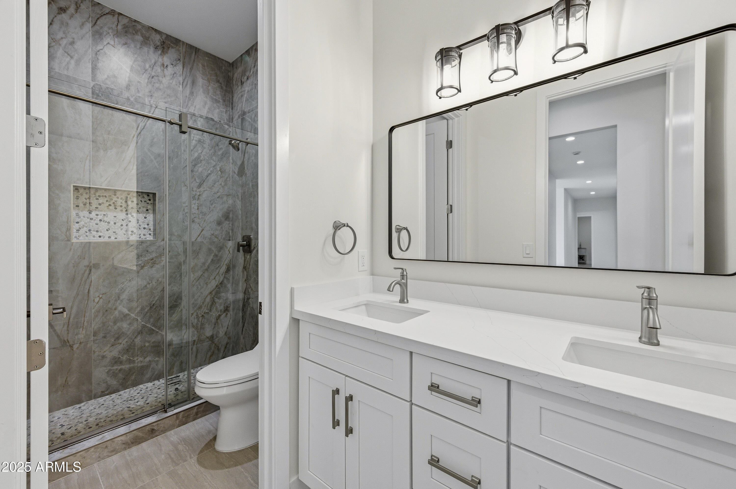 10039 North Burris Road Casa Grande, AZ 85122 - Photo 57 of 61 a bathroom with a sink a toilet and shower