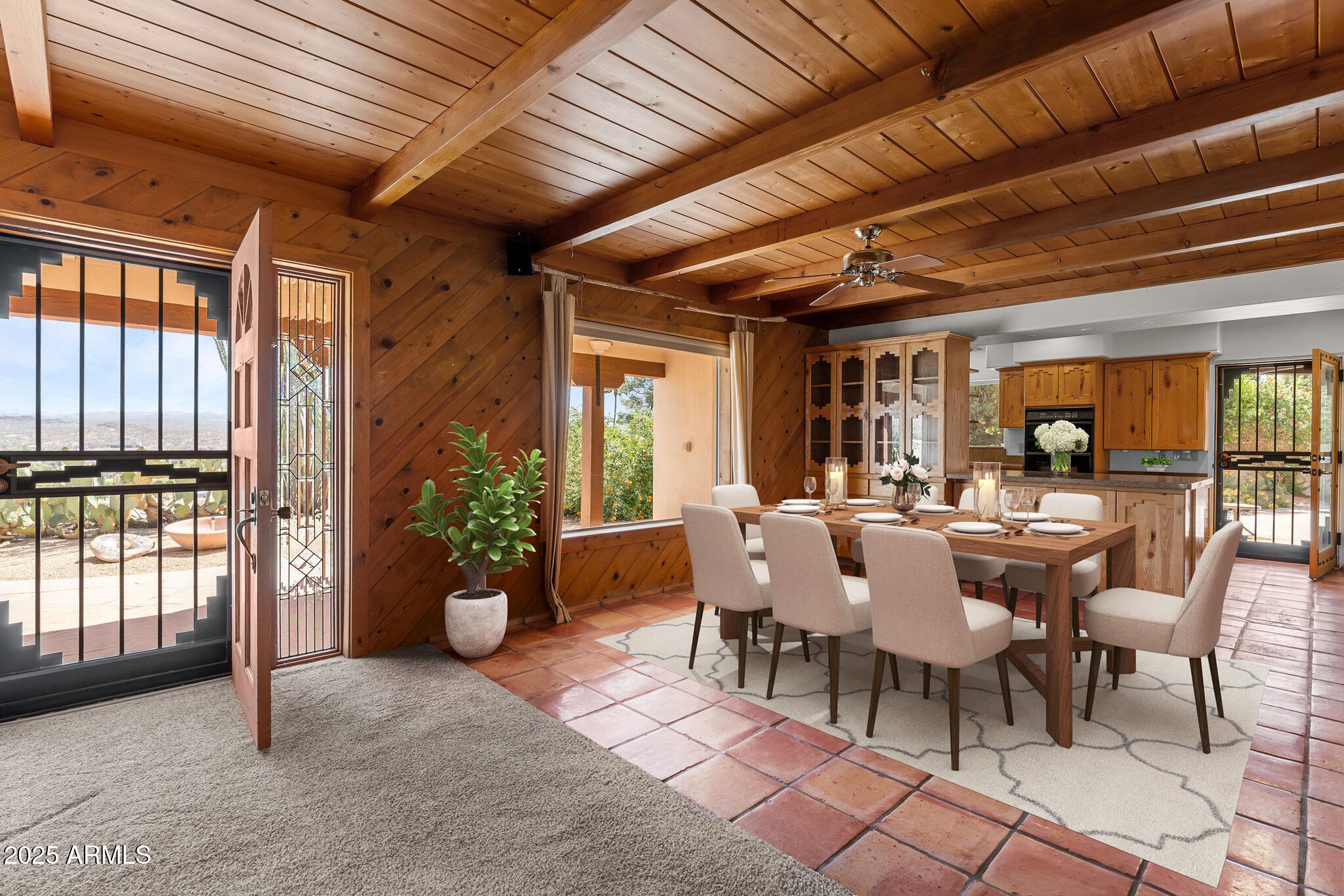 651 Chaparral Road Wickenburg, AZ 85390 - Photo 12 of 58 a view of a dining room with furniture window and outside view