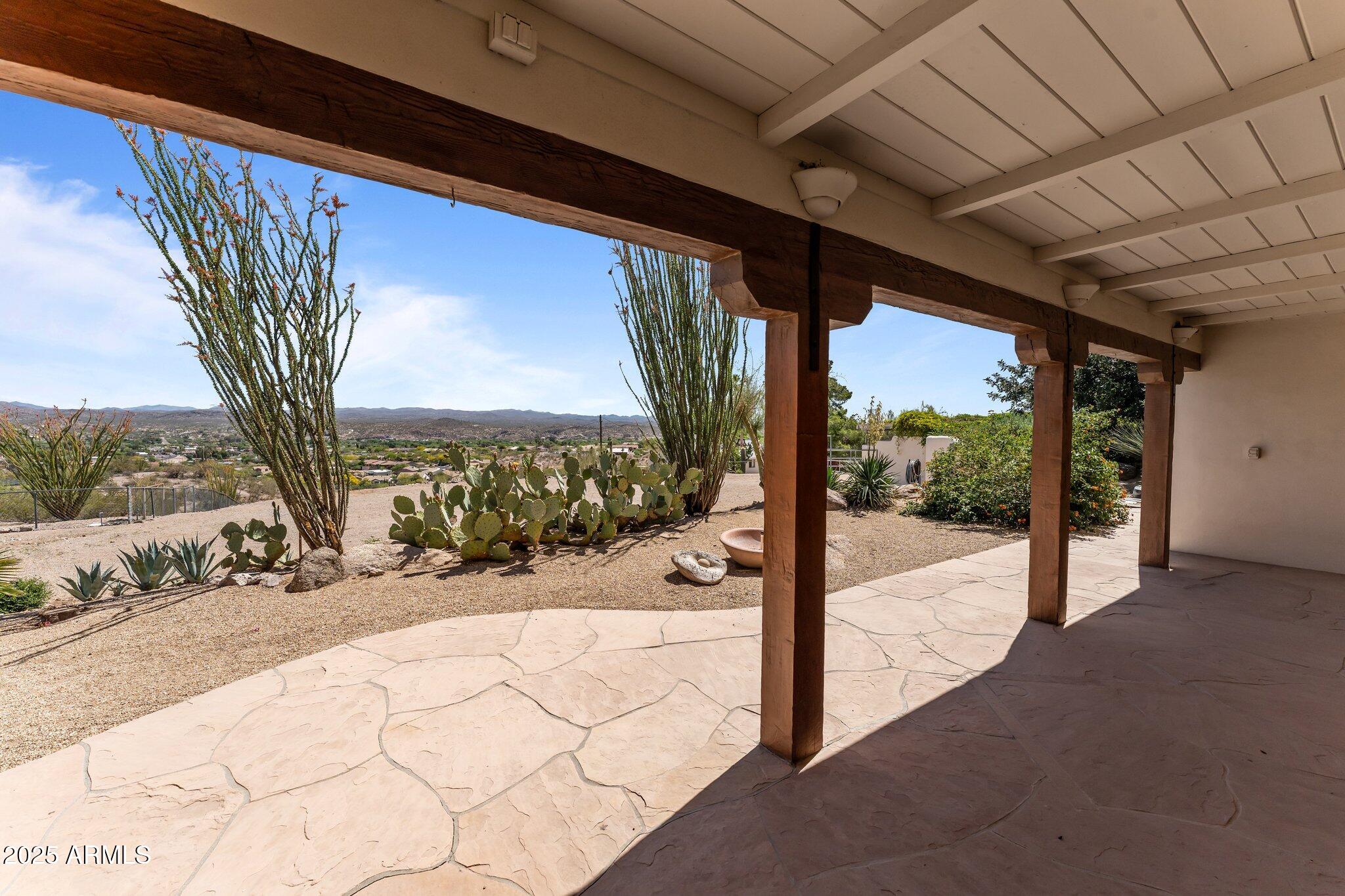 651 Chaparral Road Wickenburg, AZ 85390 - Photo 49 of 58 a view of a porch