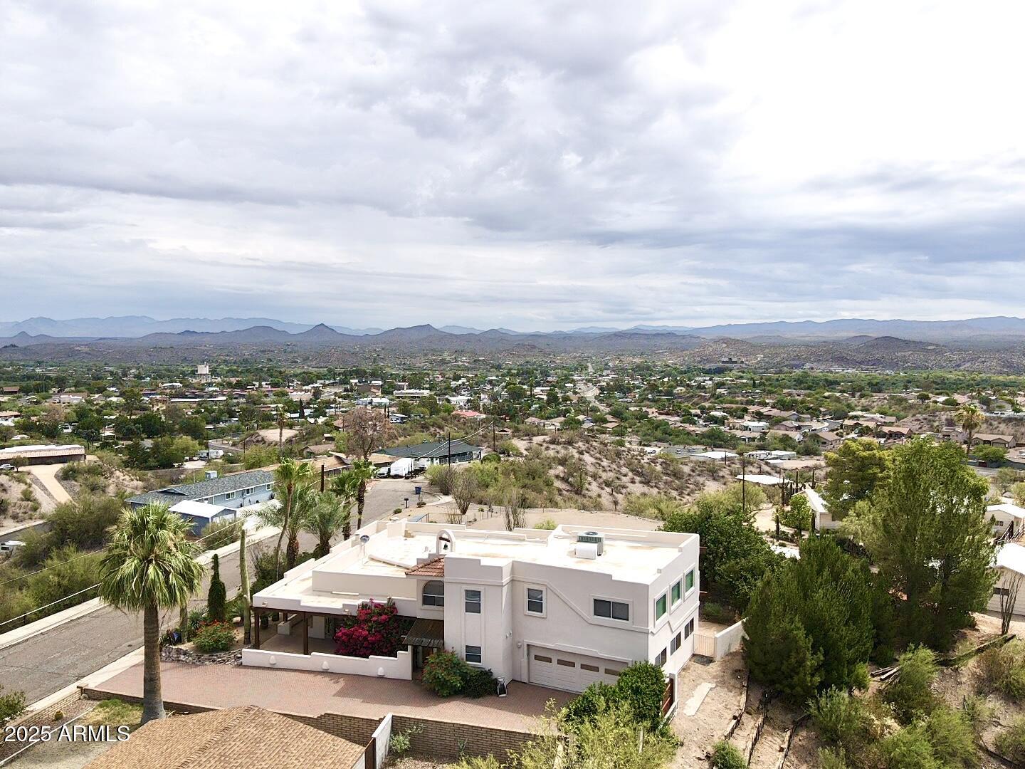 651 Chaparral Road Wickenburg, AZ 85390 - Photo 5 of 58 an aerial view of multiple house