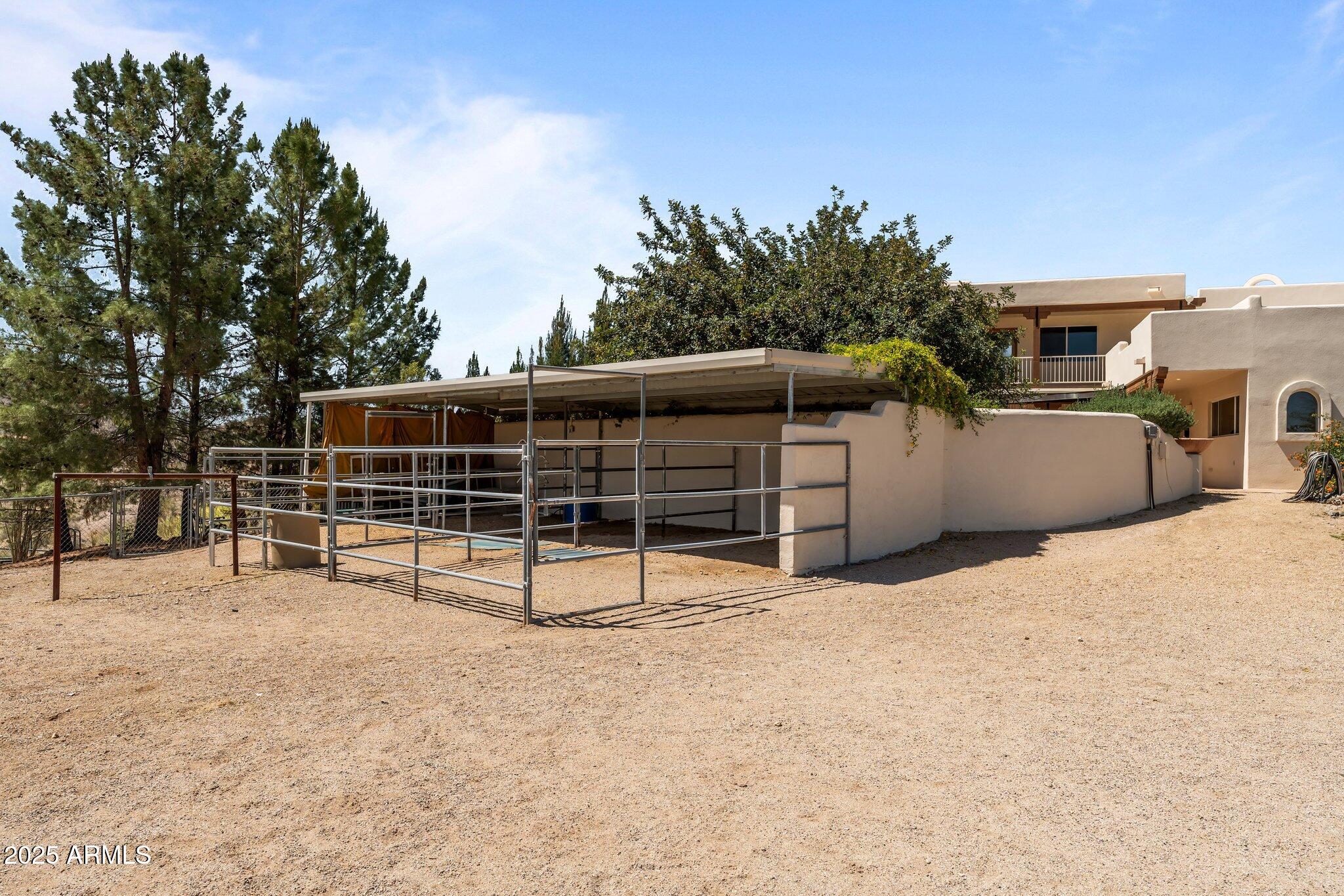651 Chaparral Road Wickenburg, AZ 85390 - Photo 54 of 58 a view of a backyard
