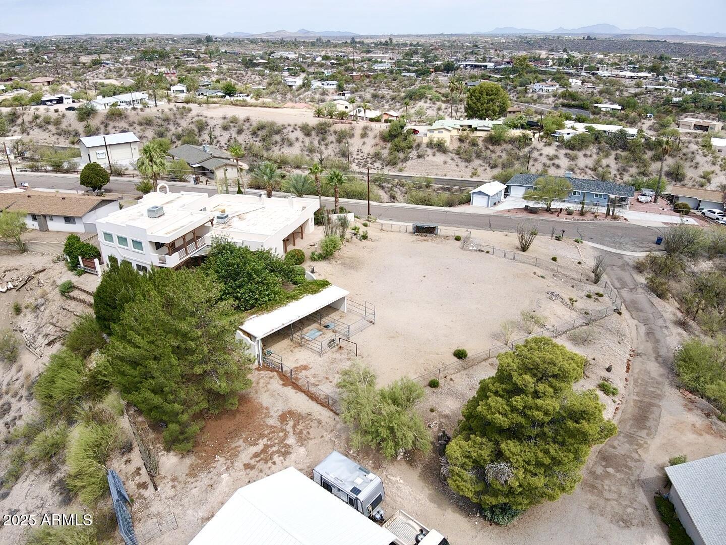 651 Chaparral Road Wickenburg, AZ 85390 - Photo 58 of 58 an aerial view of residential houses with outdoor space