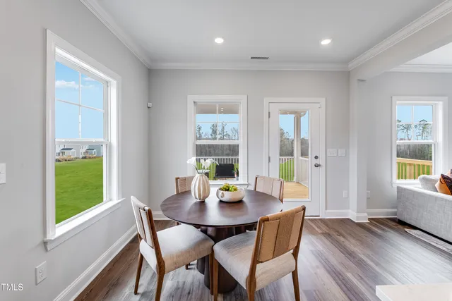 a living room with furniture and window