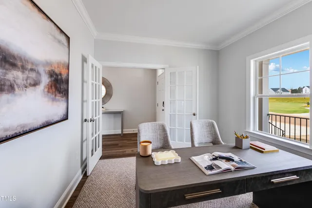 a bedroom with bed and a window