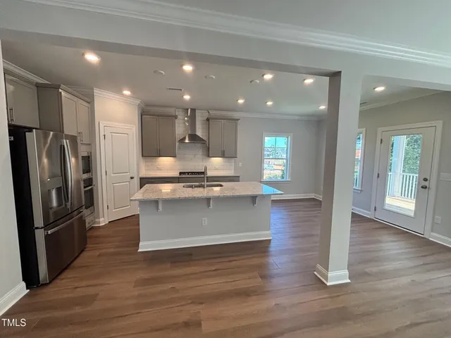 a view of entryway with wooden floor