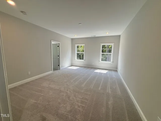 a kitchen with a sink and large window