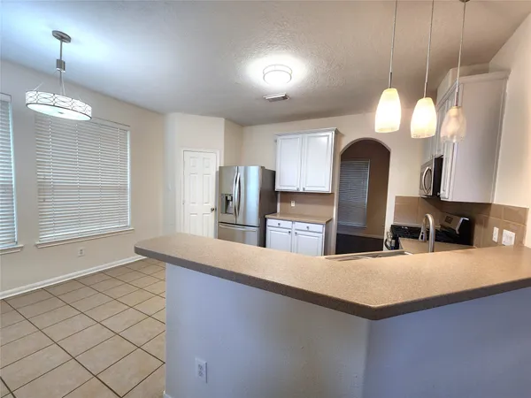a kitchen with counter top space and a sink