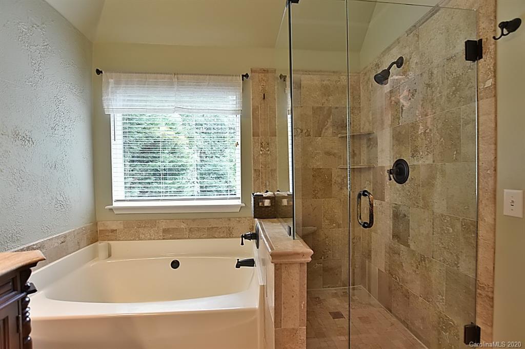 735 West Cheval Drive Fort Mill, SC 29708 - Photo 20 of 41 a bathroom with a bathtub and shower