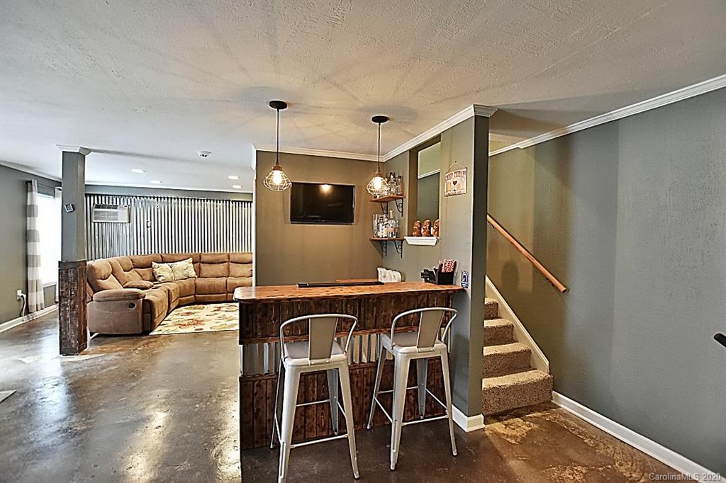 735 West Cheval Drive Fort Mill, SC 29708 - Photo 28 of 41 a dinning area with glass top table and sofas