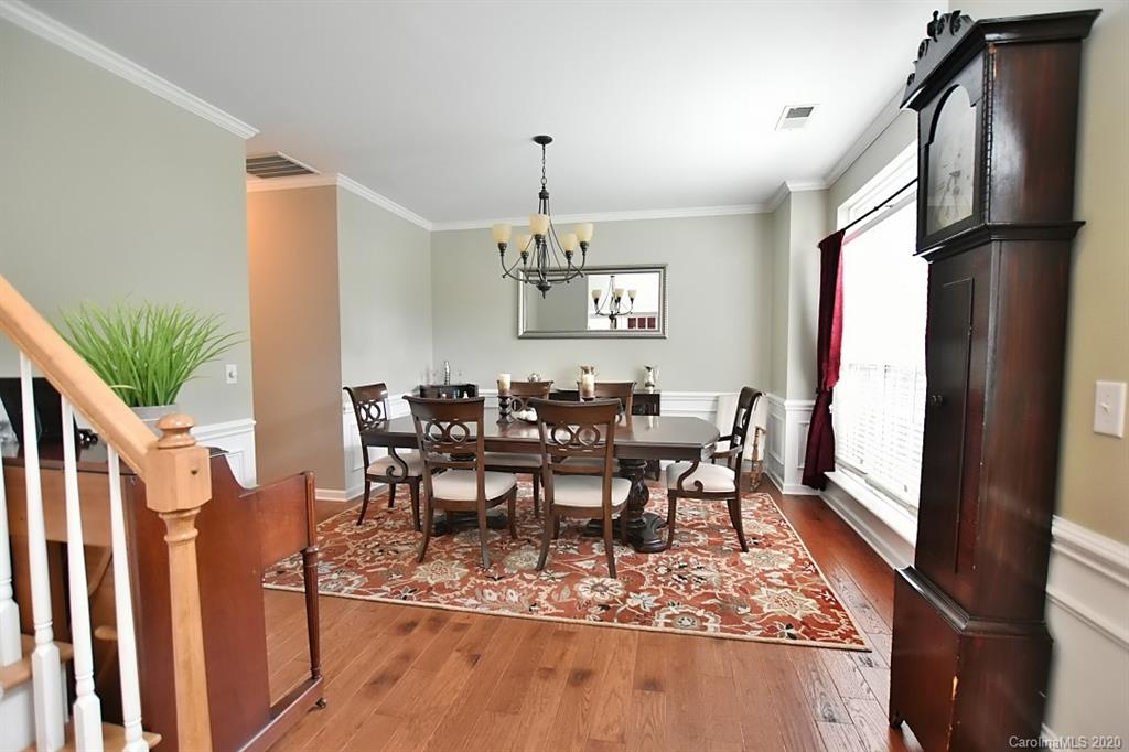 735 West Cheval Drive Fort Mill, SC 29708 - Photo 5 of 41 a view of a dining room with furniture window and wooden floor