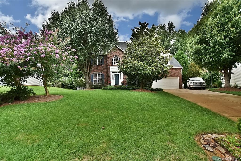 735 West Cheval Drive Fort Mill, SC 29708 - Photo 41 of 41 a view of a house with backyard and a tree