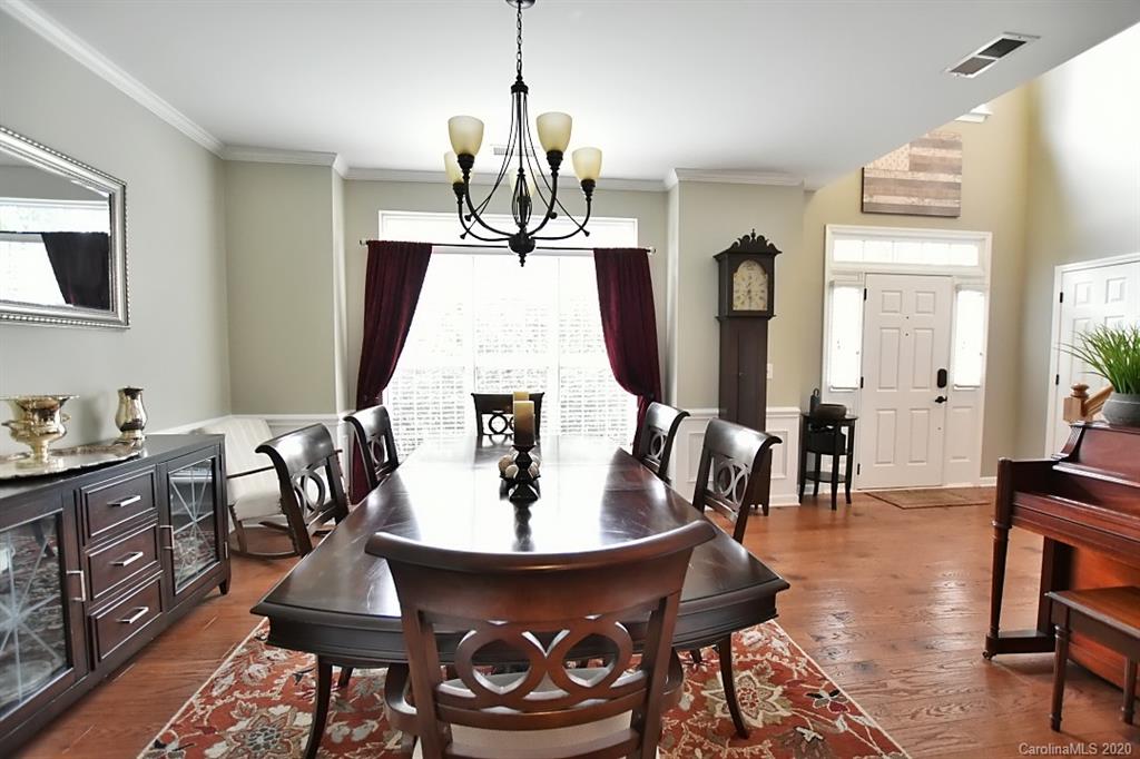 735 West Cheval Drive Fort Mill, SC 29708 - Photo 6 of 41 a living room with furniture and wooden floor