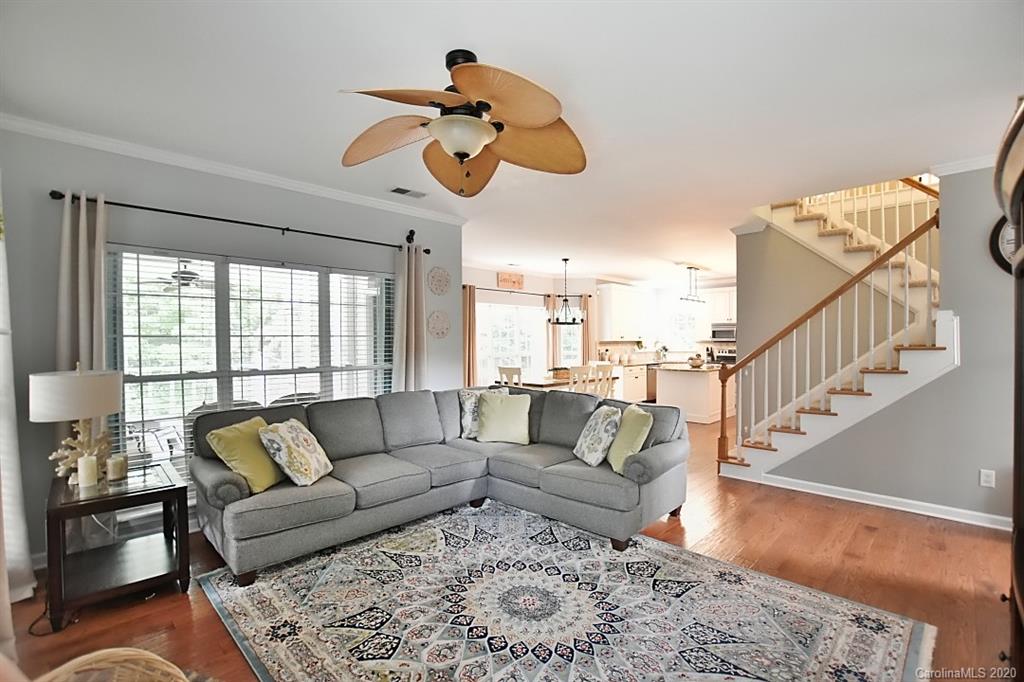 735 West Cheval Drive Fort Mill, SC 29708 - Photo 8 of 41 a living room with furniture and wooden floor