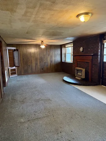 a view of a livingroom with a fireplace